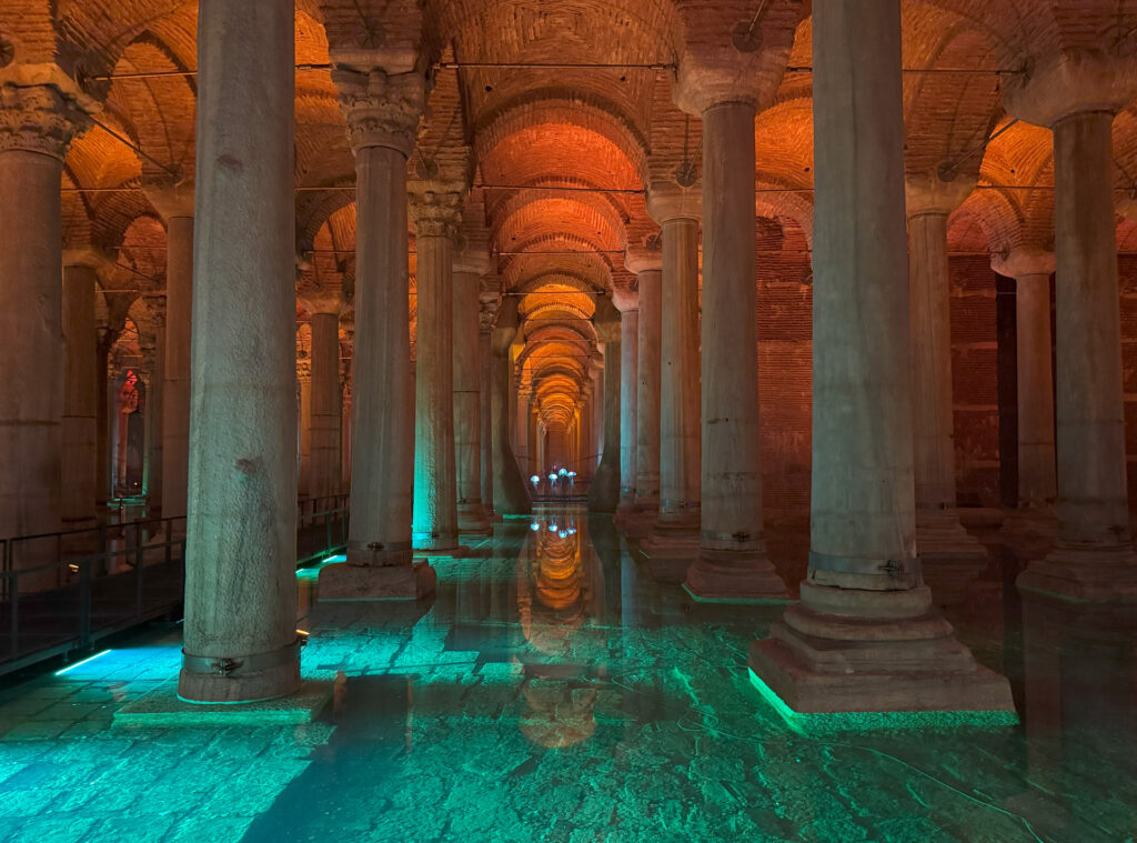 Basilica Cistern in Istanbul illuminated with orange and turquoise lights