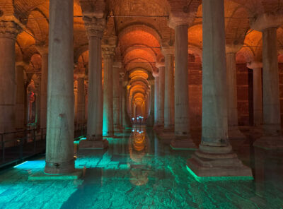 Basilica Cistern in Istanbul illuminated with orange and turquoise lights