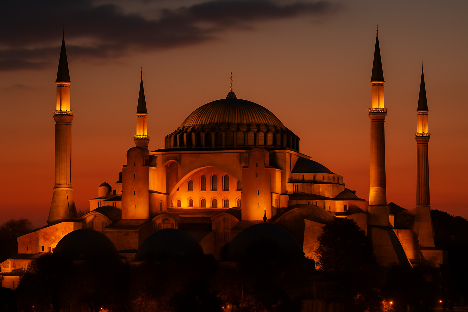 Hagia Sophia illuminated at sunset with four minarets in Istanbul, Turkey