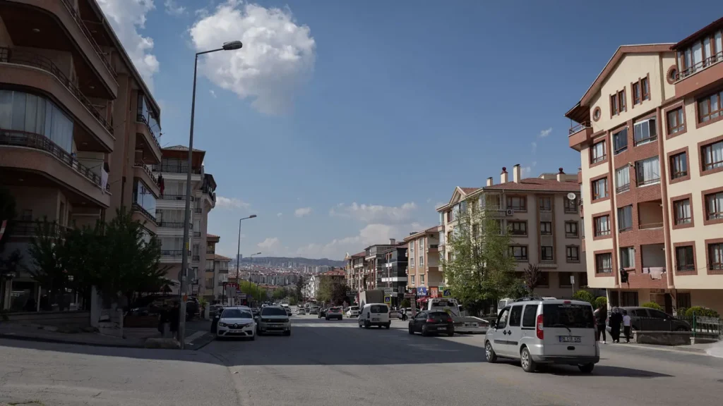 Quiet residential street in Ankara under dry midday light
