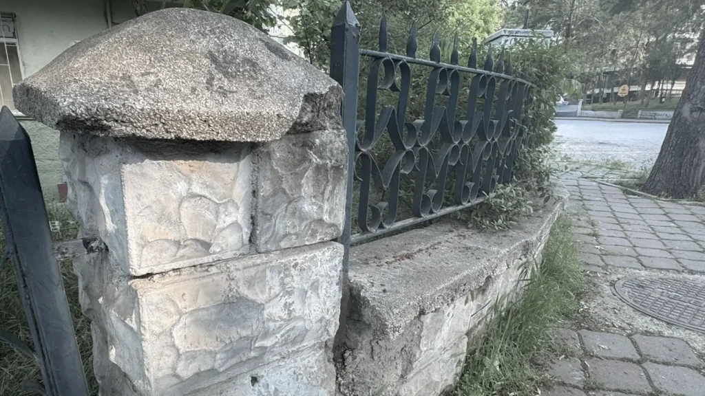 Old stone gate and quiet residential street in Ankara at morning light