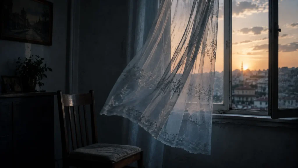 Curtain moving softly in an old Ankara apartment at dusk